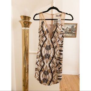 NWT. Rumor Boutique Sequin + Mesh Mini Dress. Size Small.